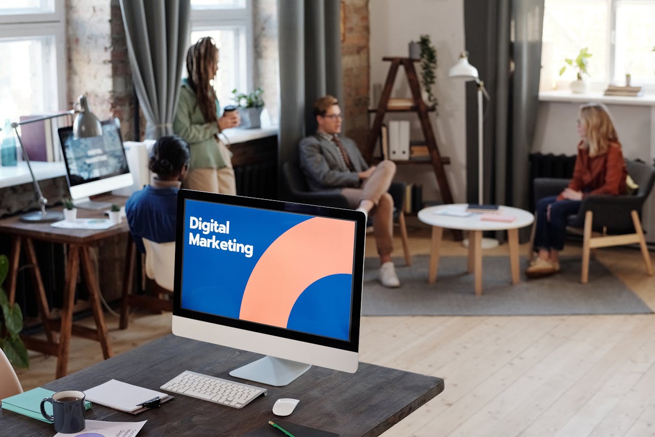 about-01 Collaborative team meeting in a modern office setting with digital marketing focus.